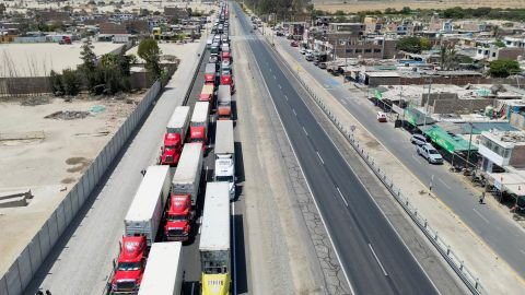 Truck drivers wait as demonstrators block a highway to Lima while demanding early elections and the release of ousted leader Pedro Castillo, in Ica, Peru December 13, 2022.  