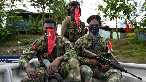 Guerrillas patrol the river at the jungle, in Choco department in Colombia, on May 23, 2019.