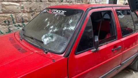 Bullet holes are seen on a car in Nablus, the day after the deadly raid.