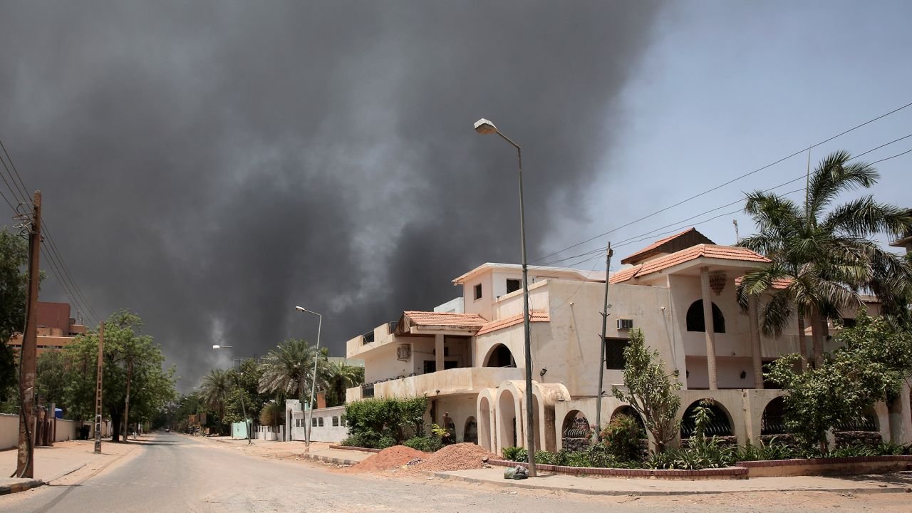 Smoke is seen rising from a neighborhood in Khartoum, Sudan, Saturday, April 15, 2023. 