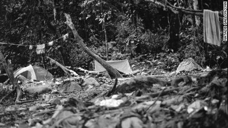 The old route, near Tres Bocas, is covered in garbage, camping tents and clothing abandoned by migrants.