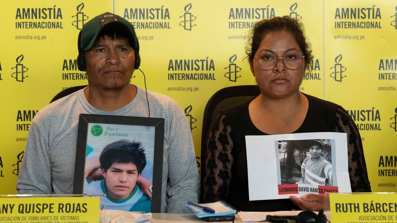 Dany Quispe and Ruth Barcena, who lost their son and husband respectively during different demonstrations, attend a press conference with Amnesty International representatives in Lima, Peru, on February 16, 2023.