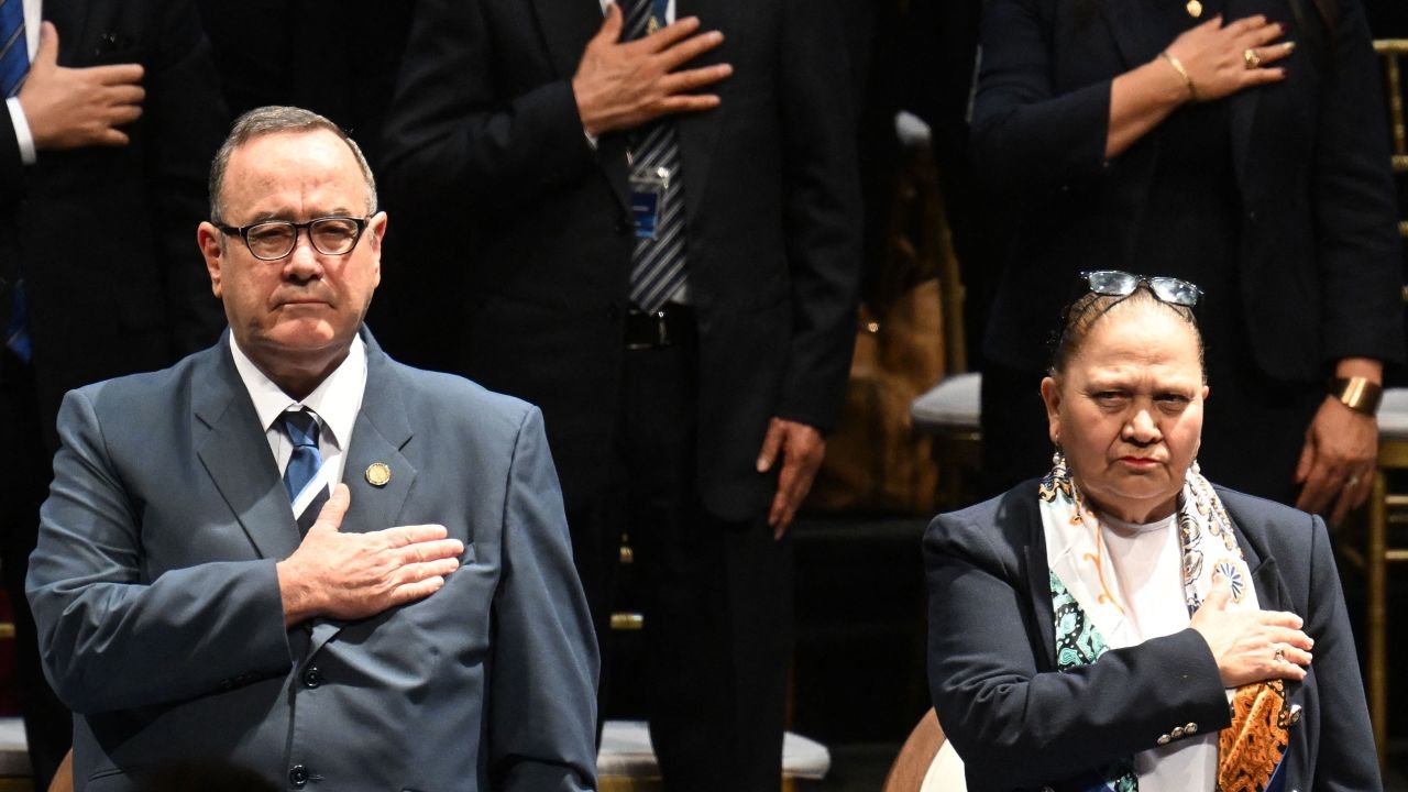 Guatemala's President Alejandro Giammattei (L) and Guatemala's Attorney General Maria Consuelo Porras attend the presentation of the annual report of the Public Ministry in Guatemala City on May 17, 2023.