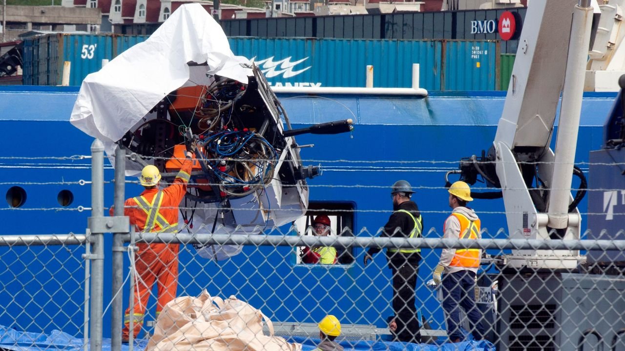 Titan debris brought up from the ocean floor is unloaded Wednesday from the Horizon Arctic ship at the Canadian Coast Guard pier in St. John's.