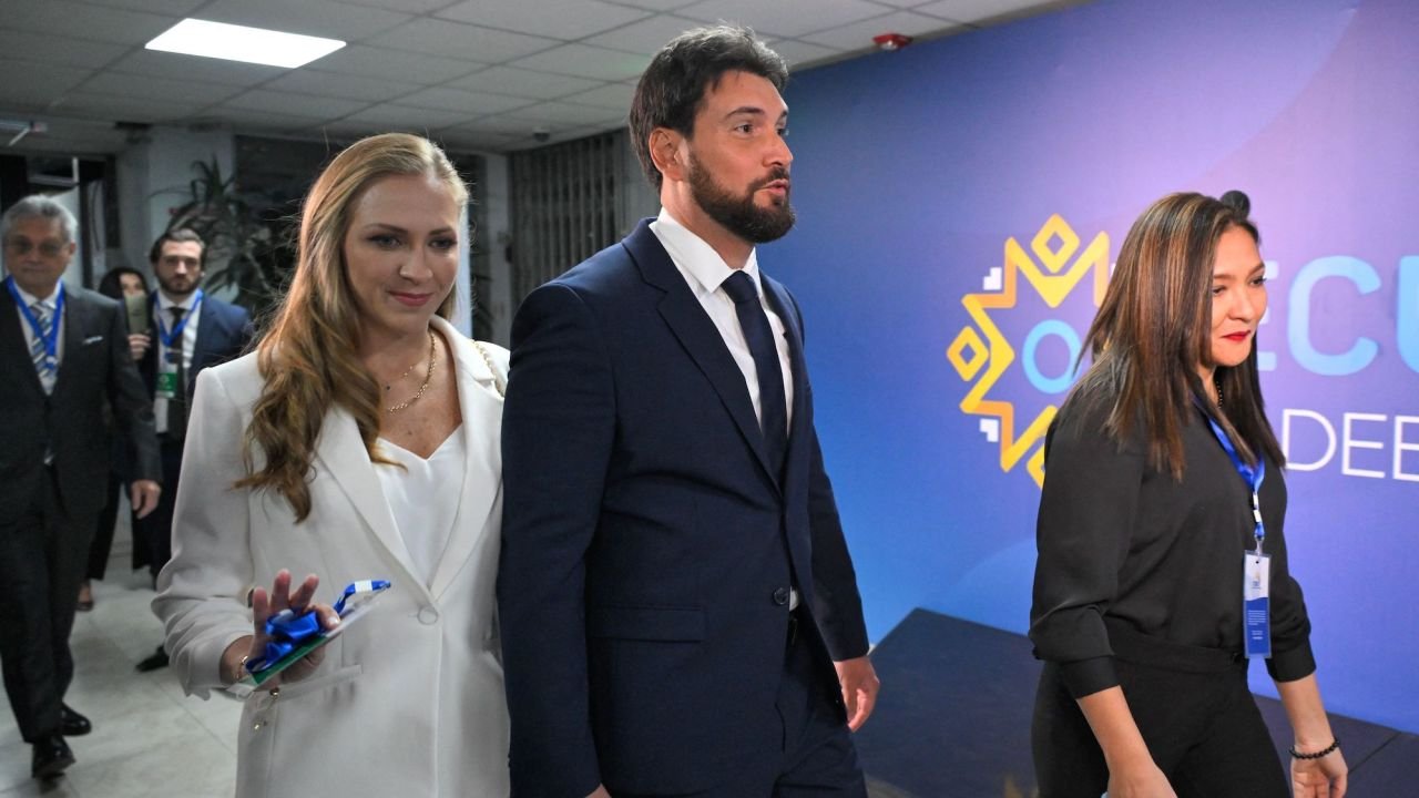 Ecuadorian presidential candidate Jan Topic, accompanied by his wife Pity Guzman, ahead of Sunday's presidential debate.