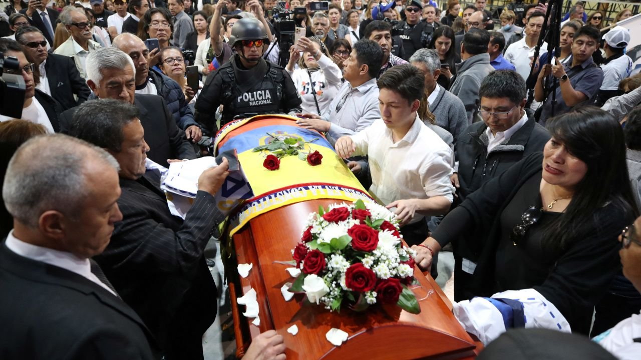 Friends, family members and supporters of Ecuadorean presidential candidate Fernando Villavicencio attend a tribute at Quito Exhibition Center.