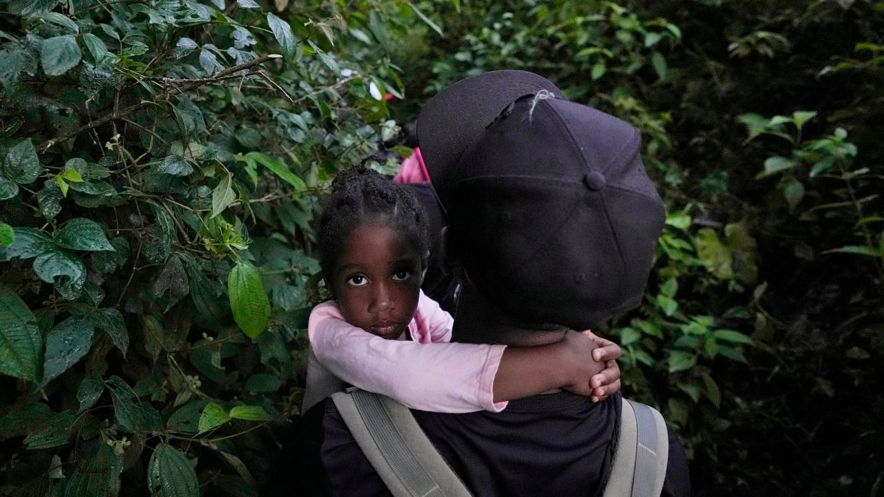 Migrants on their way to crossing the Darien Gap in September 2021.