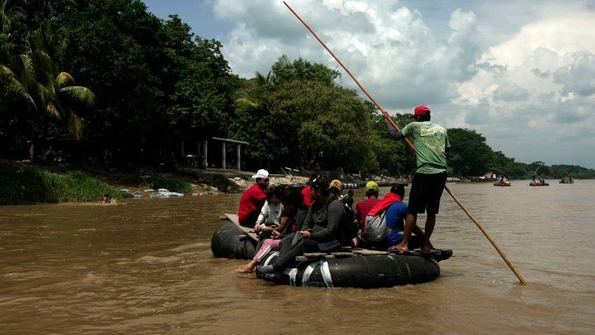 Migrants from Venezuela on an improvised raft cross the Suchiate river between Guatemala and Mexico in Southern Mexico on 27 September 2023. (Photo: David von Blohn/CNN)